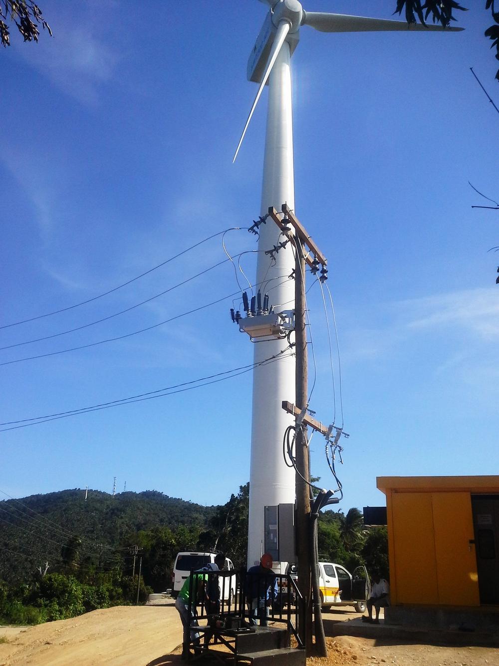 NOJA Power OSM Recloser Point of Connection in front of a wind turbine in the Philippine 