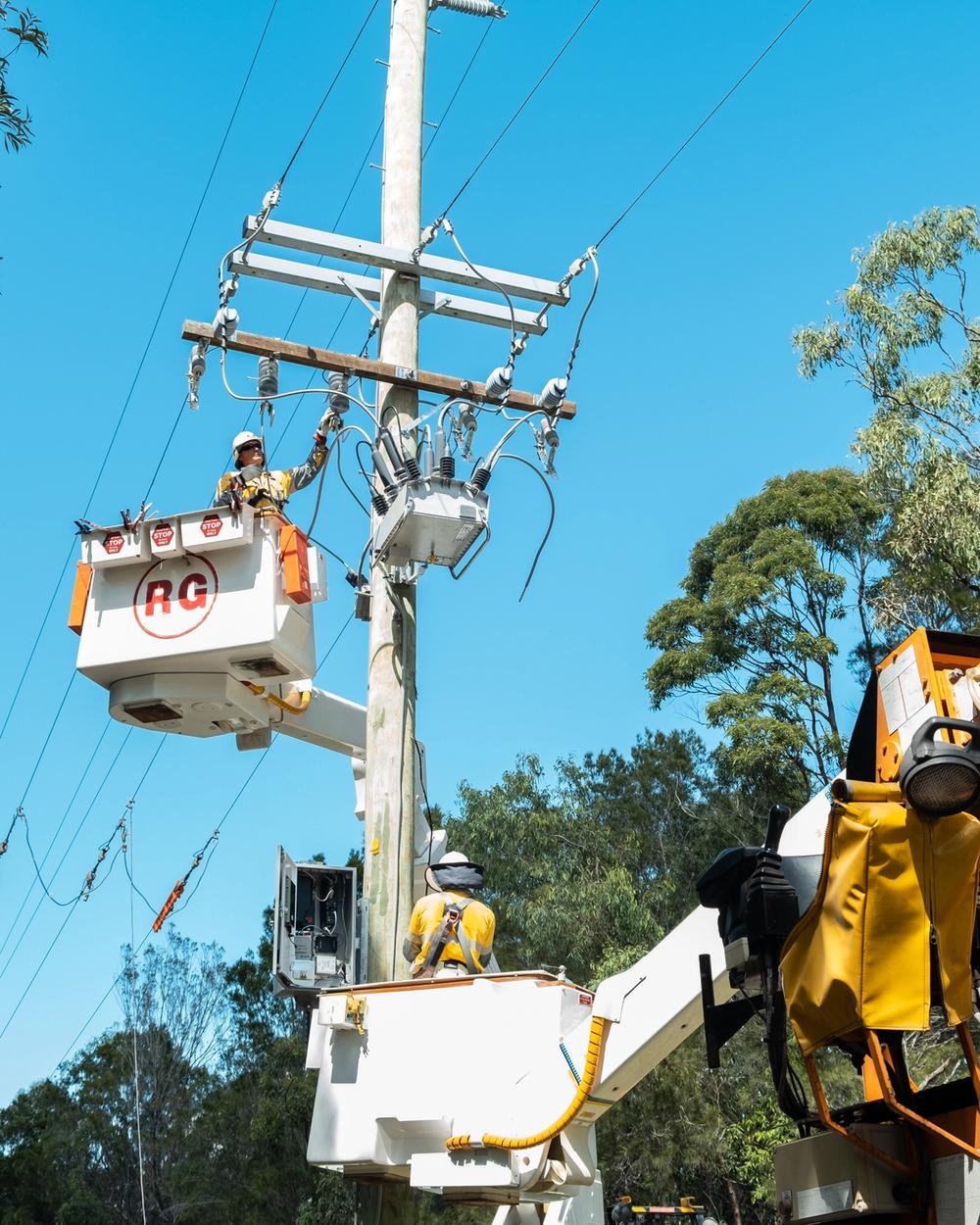 Image of NOJA Power RC20 looking from the ground under installation using a bucket truck