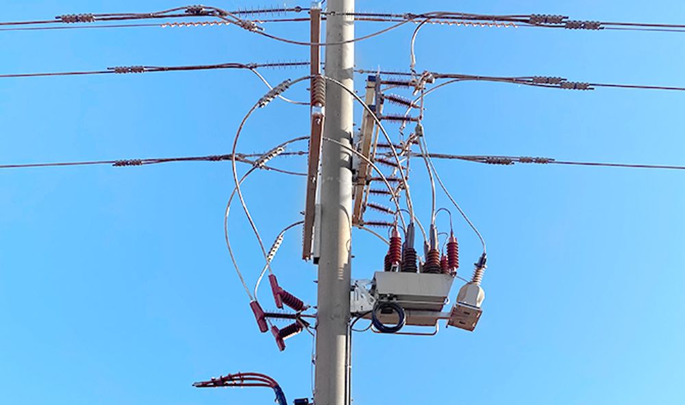 A close up NOJA Power Mobile Substation Mining Installation with blue skies behind