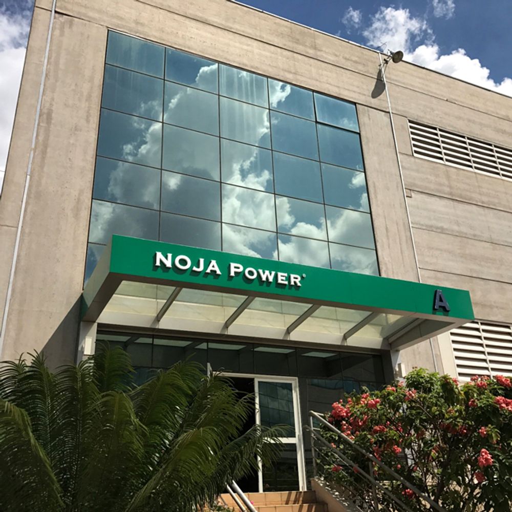 Grand Entrance to new NOJA Power Brazil facility with NOJA Power branding over entrance
