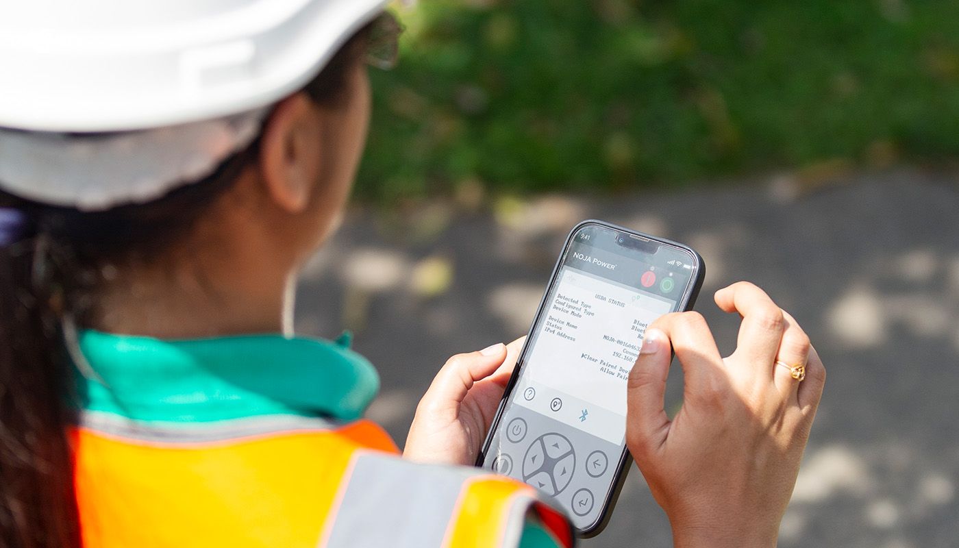 Engineer using NOJA Power's Remote HMI App