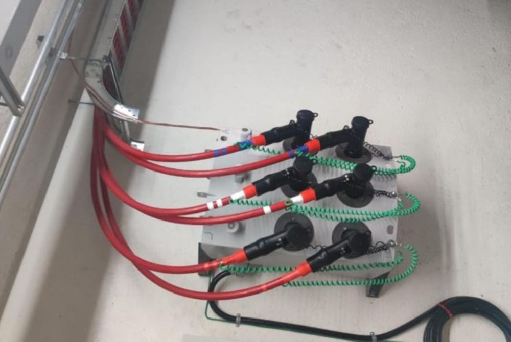 An OSM27 Recloser fitted with DIN-C Dead Break Elbow cable terminations