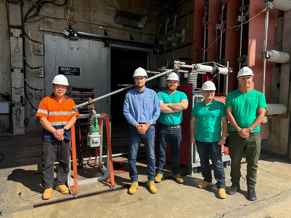 NOJA Power staff with the EcoLink at KEMA Laboratories, Pennsylvania, USA.