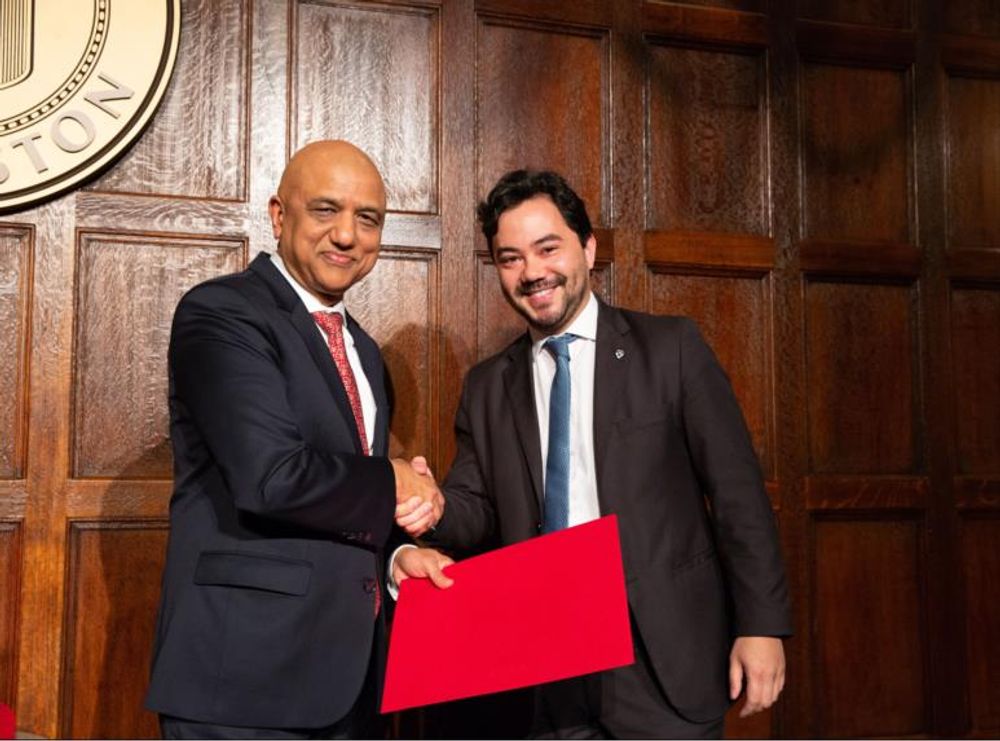 Bruno Kimura, Managing Director – NOJA Power Brazil (Right), accepting his Harvard Business School MBA Certification