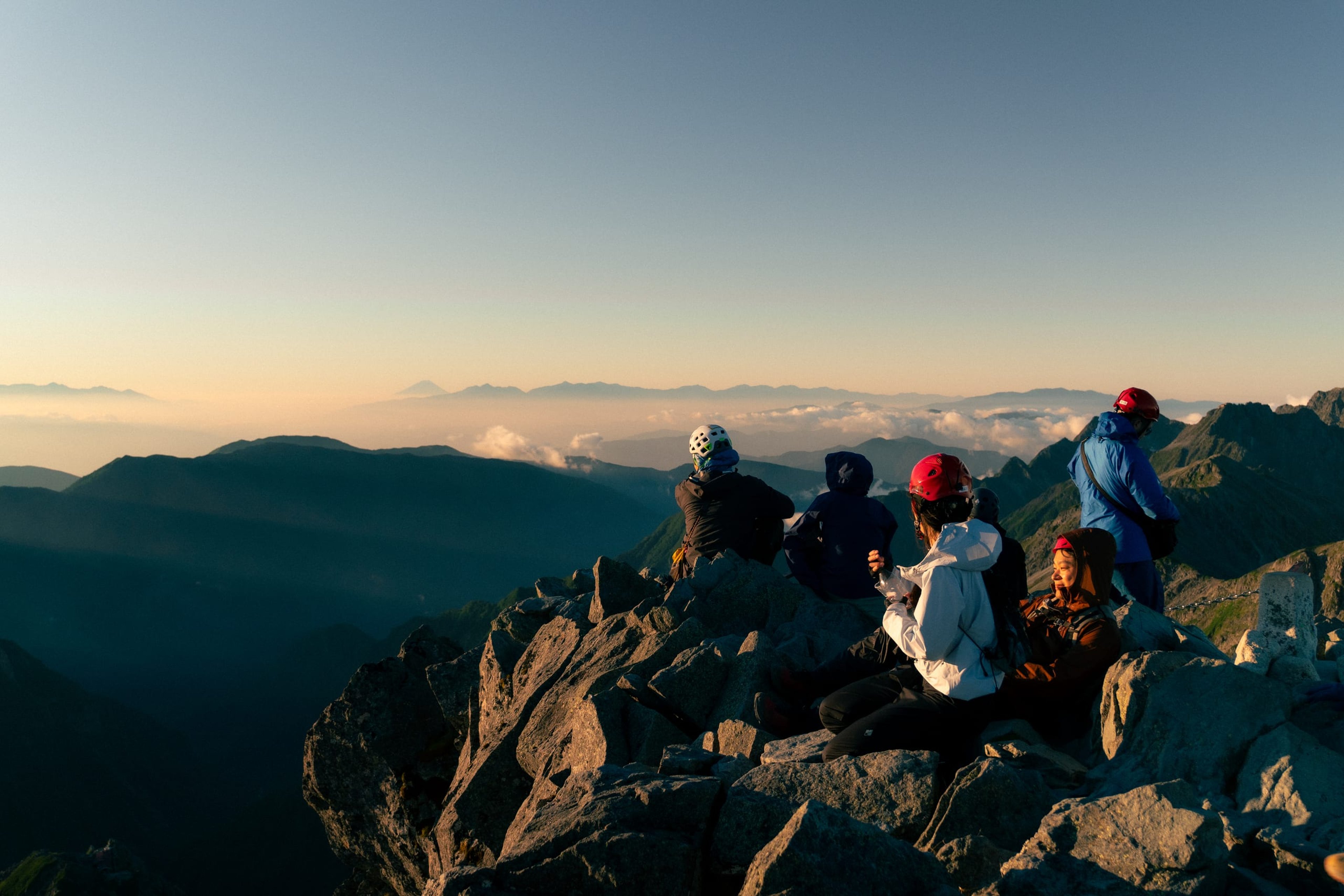 Admiring the sunrise over fuji ontop the summit of Yarigatake