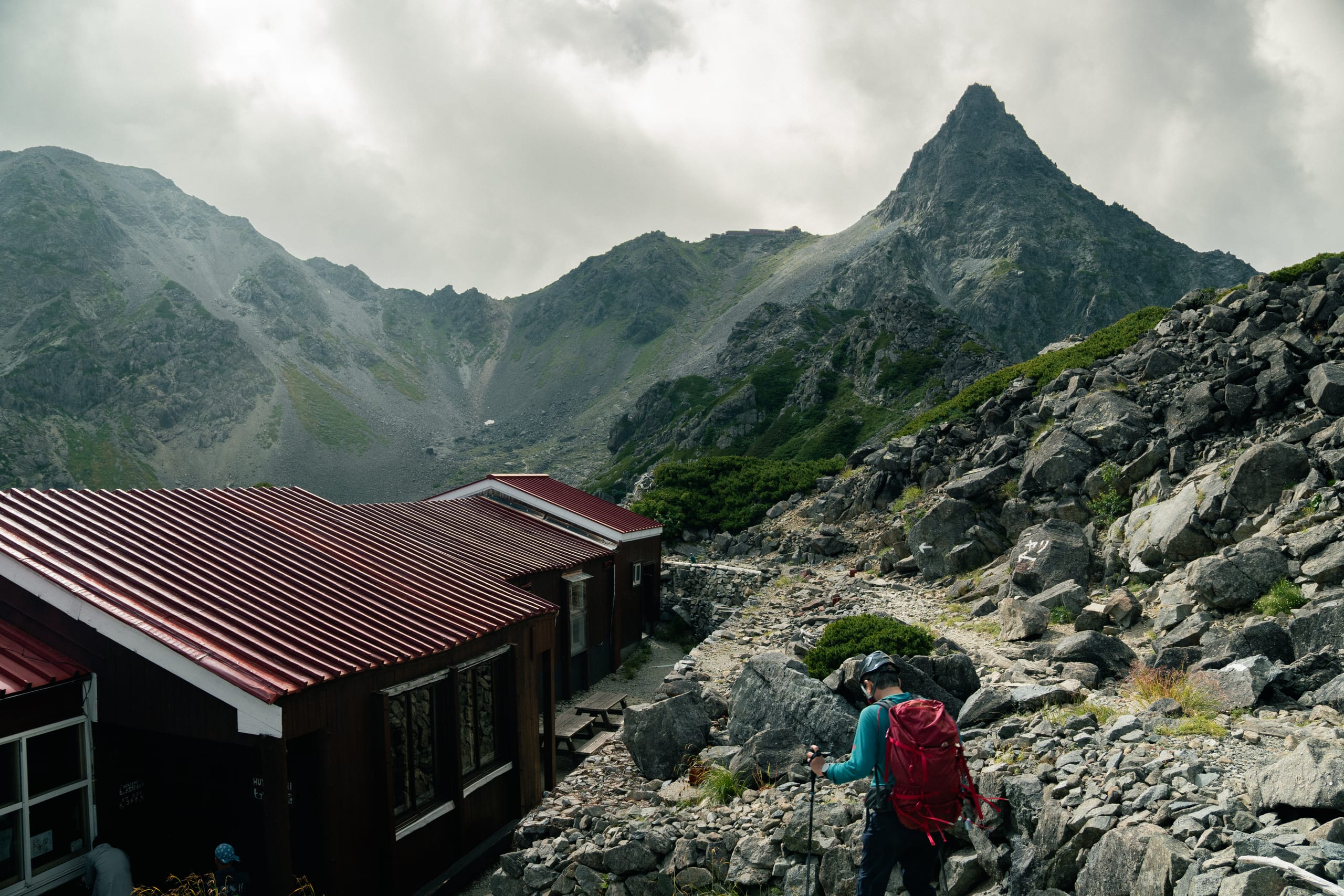 Hiker makes his way toward the hut before Yarigatake
