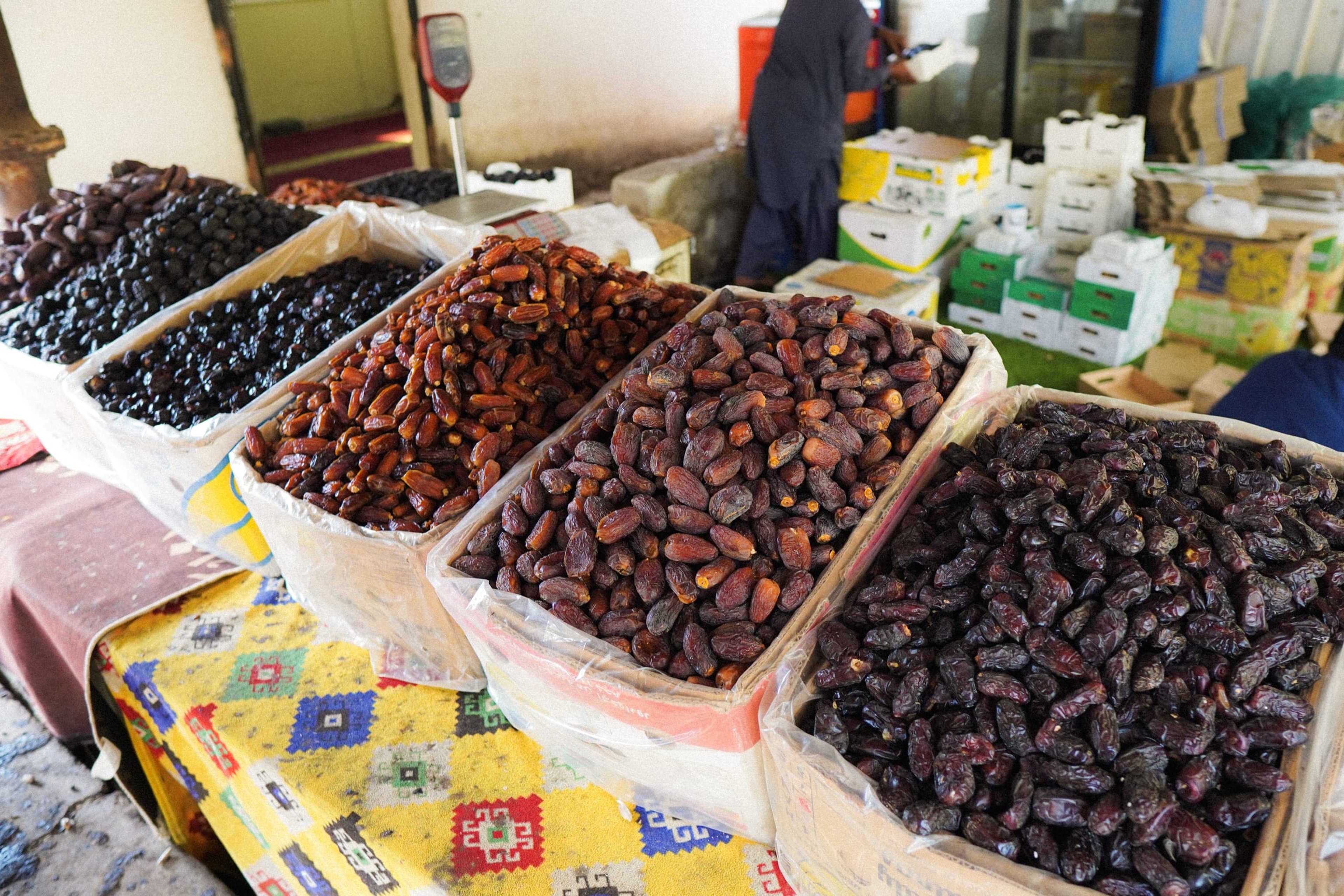 Dates, grown in the farm, being sold in the market