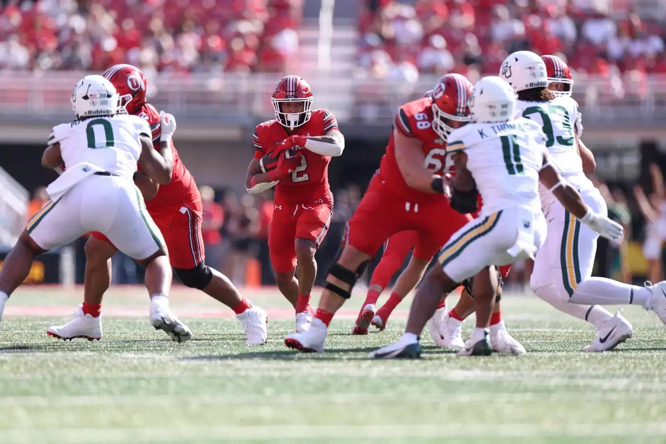 Utah RB Micah Bernard rushes against the Baylor defense