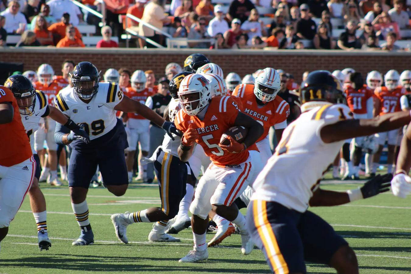 Mercer's RB runs against ETSU's defense