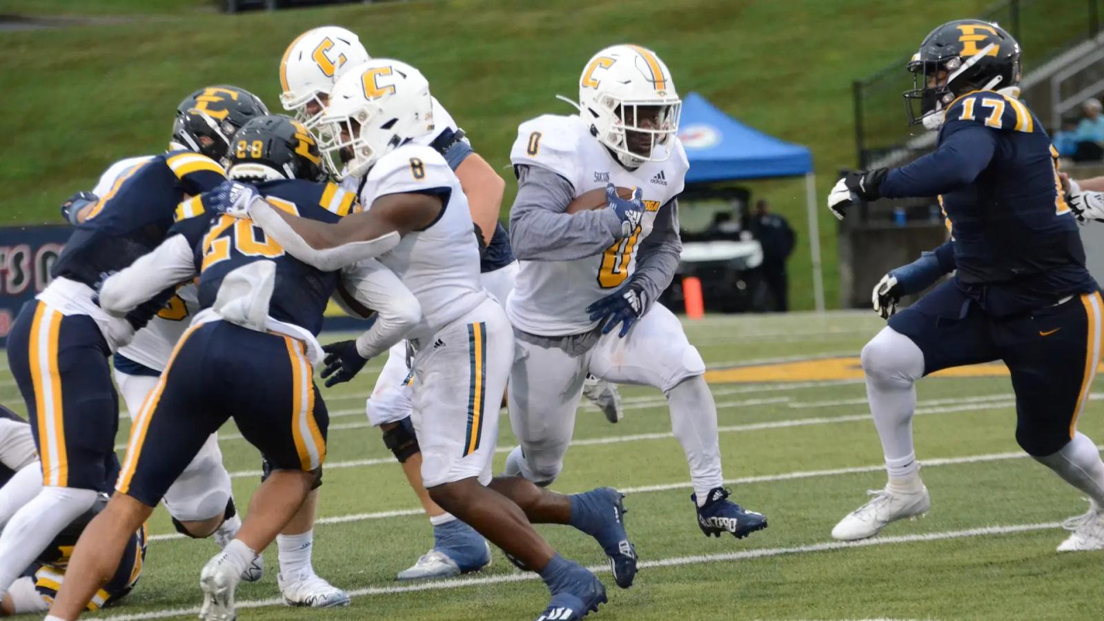 UTC's Ailym Ford runs against ETSU in the Rail Rivalry