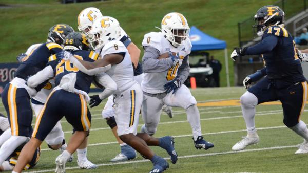 UTC's Ailym Ford runs against ETSU in the Rail Rivalry