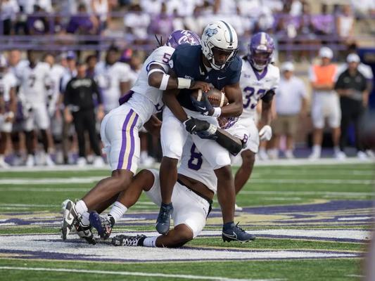 Va Lealaimatafao and Hayward McQueen Jr. combine on a tackle against Samford.