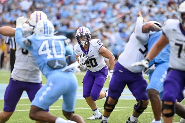 JMU RB Tyler Purdy rushes against North Carolina during a 70-50 win