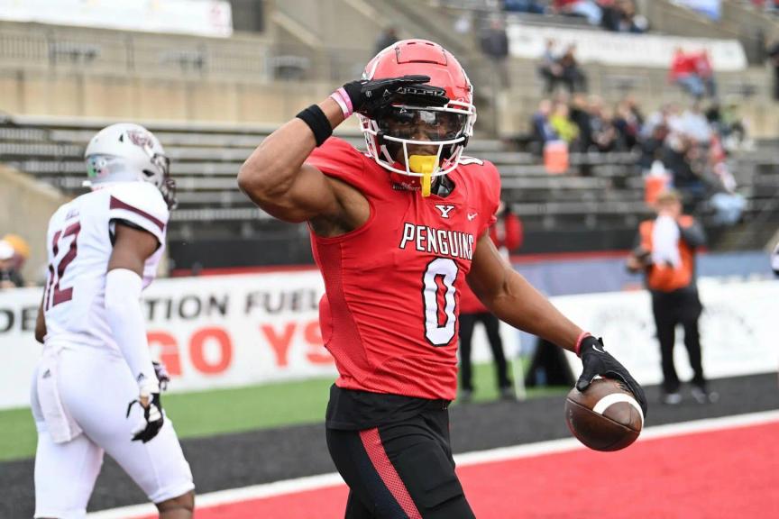 Youngstown State's Bryce Oliver saluting the camera after a touchdown.