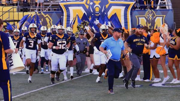 Murray State Football team running onto the field