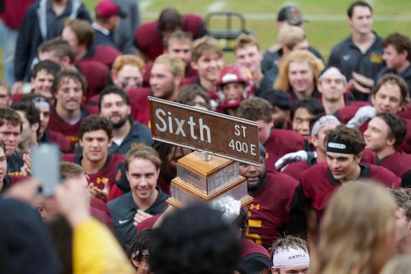 Sixth St rivalry trophy being raised by CMS Stags