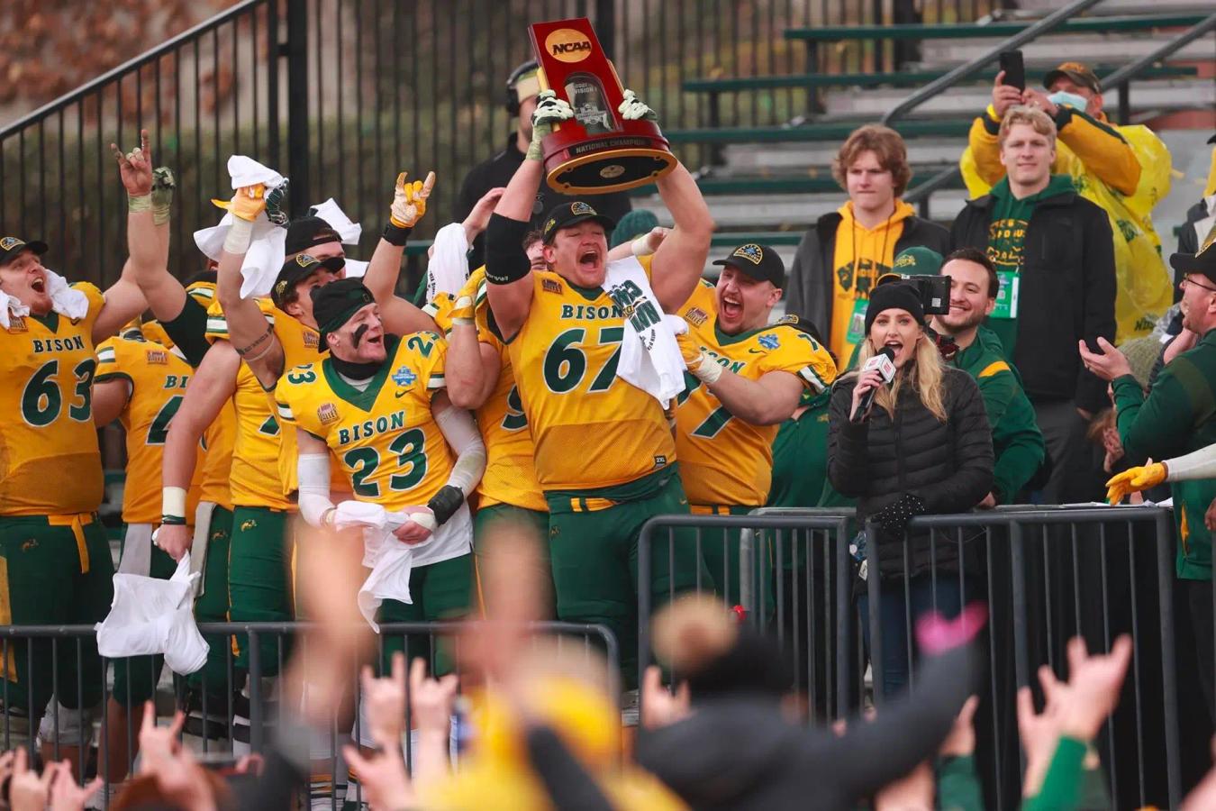 Cordell Volson lifts the FCS championship trophy
