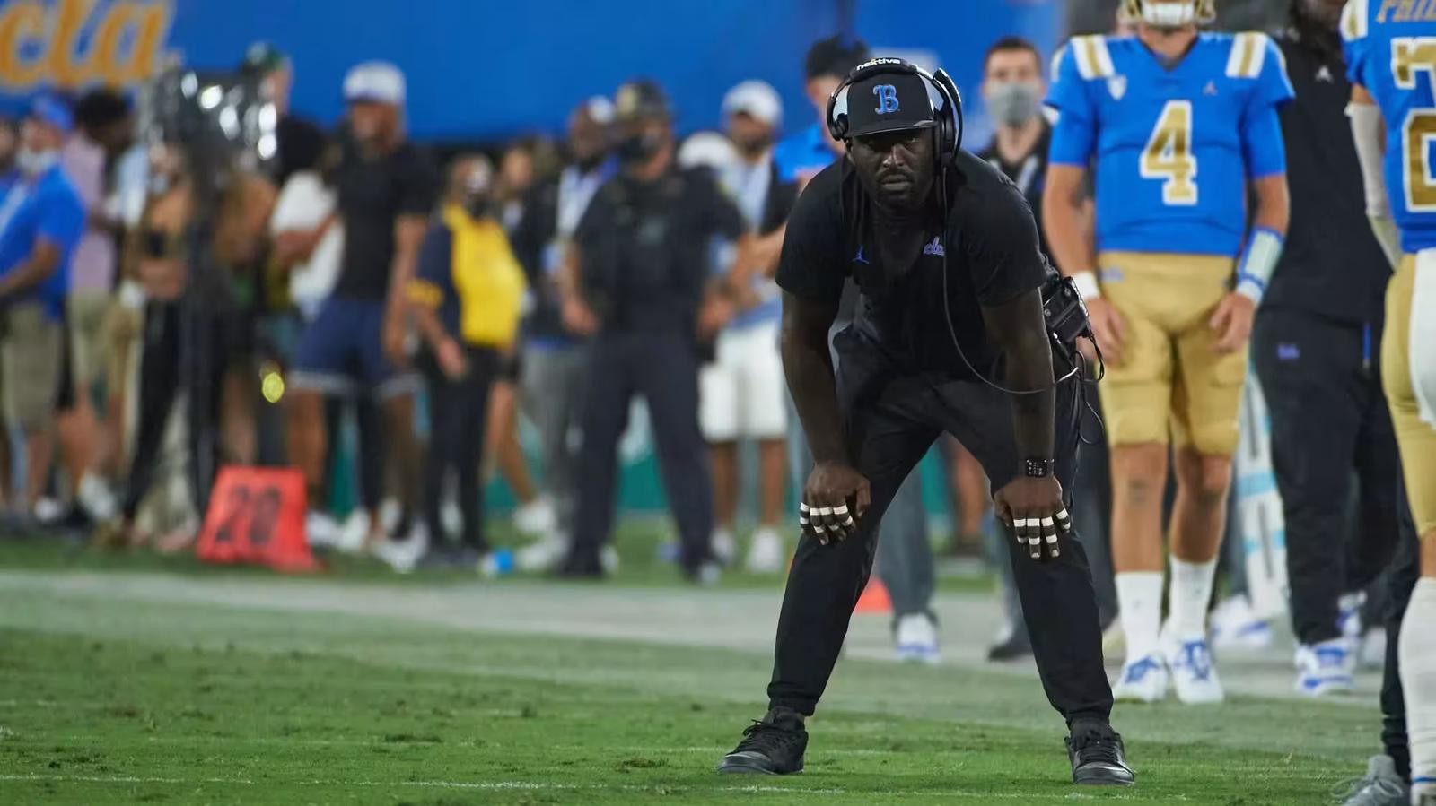 Former UCLA Head Coach DeShaun Foster along the sideline during a game