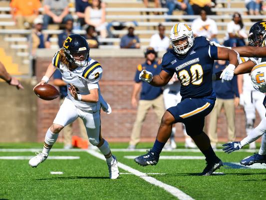 UTC's Devonnsha Maxwell chases down ETSU's Tyler Riddell
