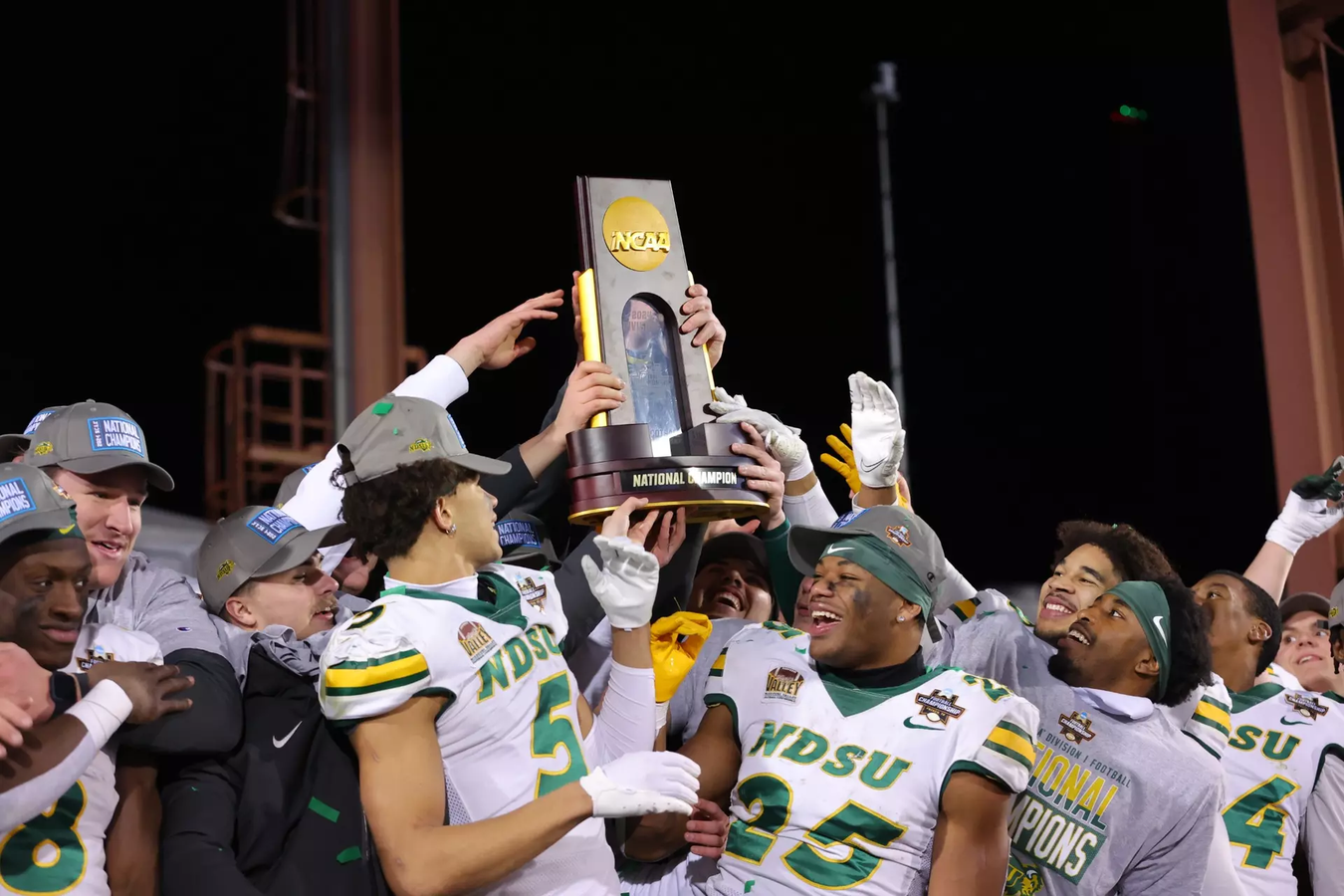 NDSU football raise the FCS National Championship trophy