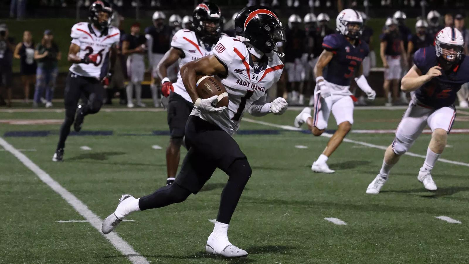 Saint Francis WR Casey McKinney advances up the field after catching a pass.