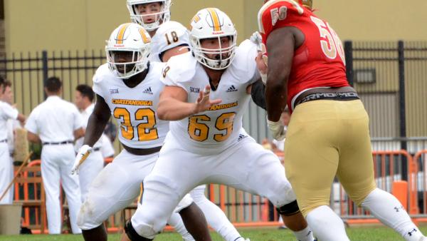 Chattanooga's Cole Strange pass protects against VMI's Warren Dabney