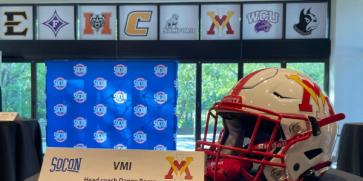 VMI Football helmet with card naming Head Coach Danny Rocco, WR Chance Knox, and DB Alex Oliver at the 2023 SoCon Media Day