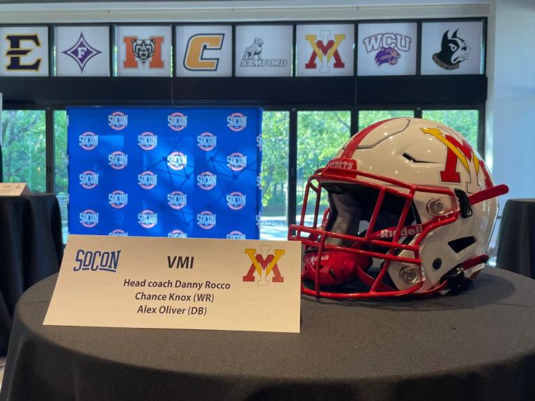 VMI Football helmet with card naming Head Coach Danny Rocco, WR Chance Knox, and DB Alex Oliver at the 2023 SoCon Media Day