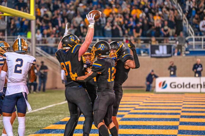 South Dakota State celebrates after scoring a touchdown against Montana State