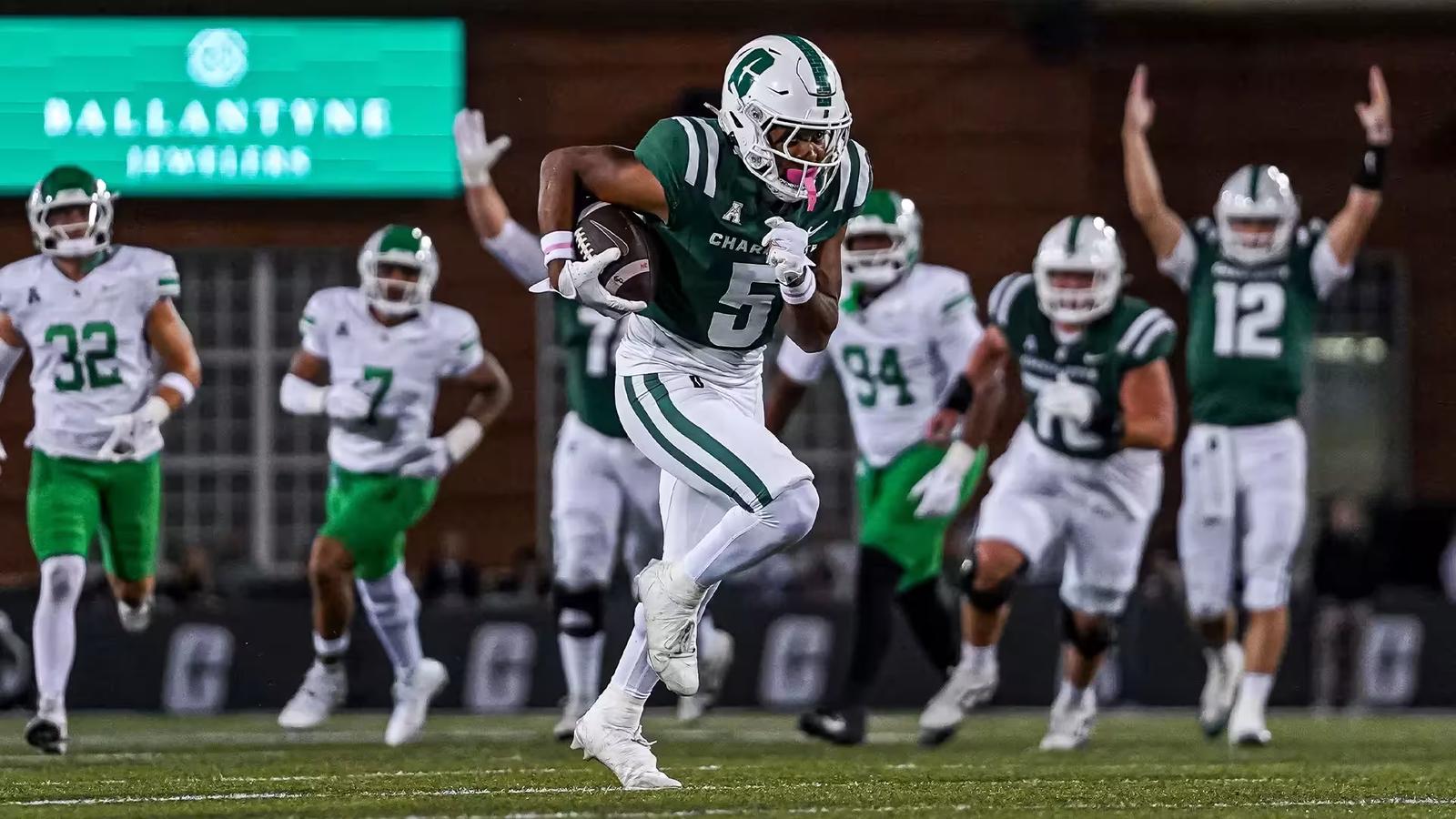 Javen Nicholas runs after a catch