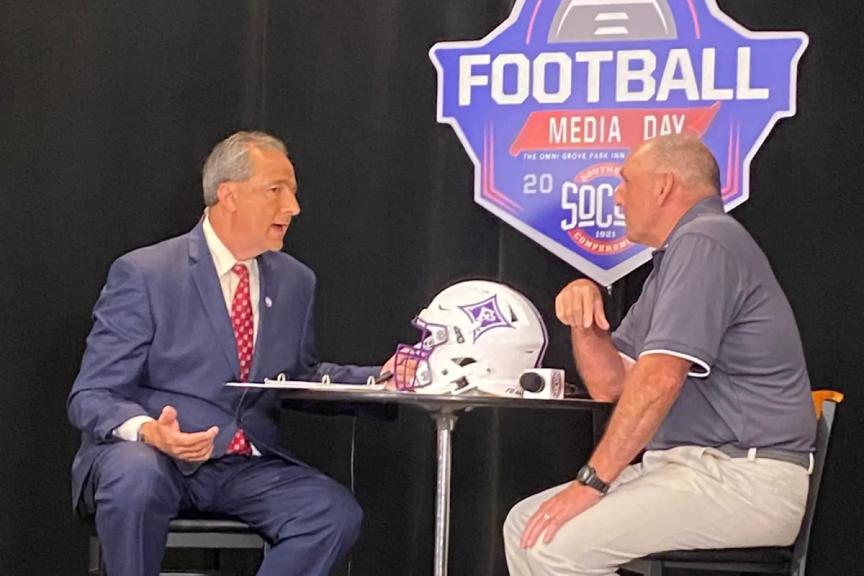 Furman Head Coach Clay Hendrix being interviewed during the 2022 SoCon Media Day