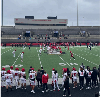 A photo of both teams during the Red-White YSU Spring Game