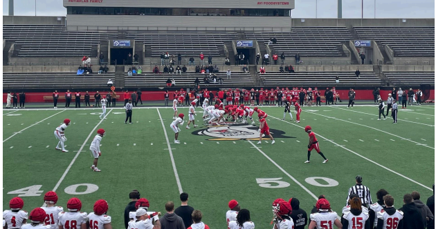 A photo of both teams during the Red-White YSU Spring Game