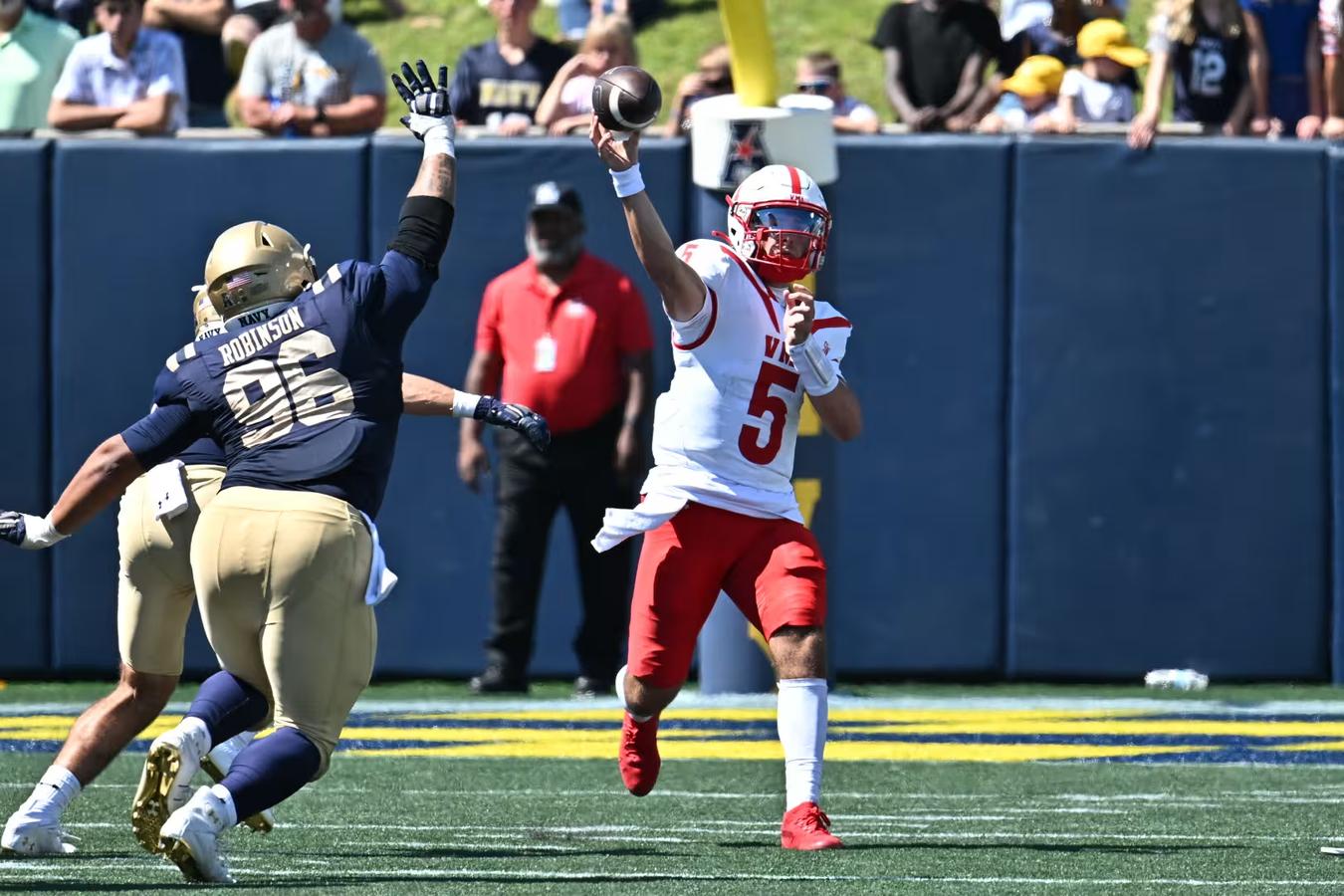 VMI QB Collin Shannon throws a pass during their 52-7 loss against Navy on August 30, 2025