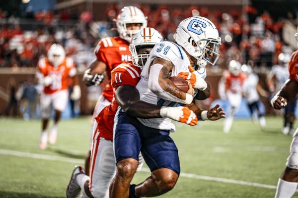 The Citadel's Sam Llewellyn tackled by a host of Mercer defensive players