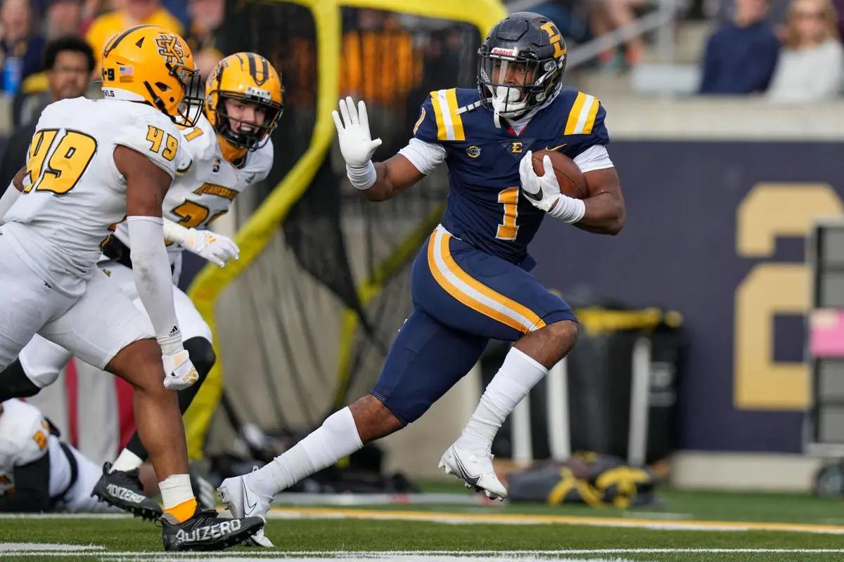 East Tennessee State running back Quay Holmes scores a touchdown against Kennesaw State