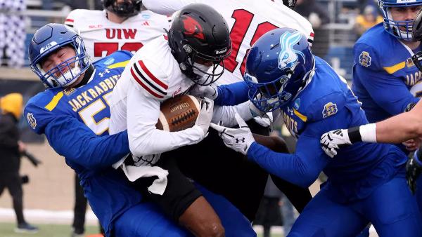 South Dakota State defender tackles an Incarnate Word player during the FCS Playoffs quarterfinals.