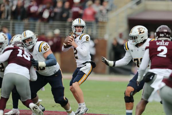 ETSU's QB Tyler Riddell drops back against Mississippi State