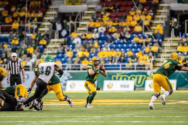NDSU QB Cole Payton attempts a pass against North Dakota