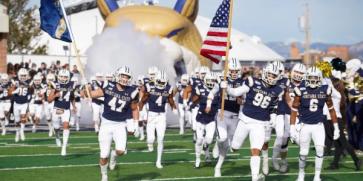 Montana state bobcats football team take the field at Bobcat Stadium