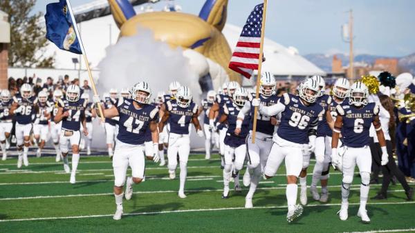 Montana state bobcats football team take the field at Bobcat Stadium