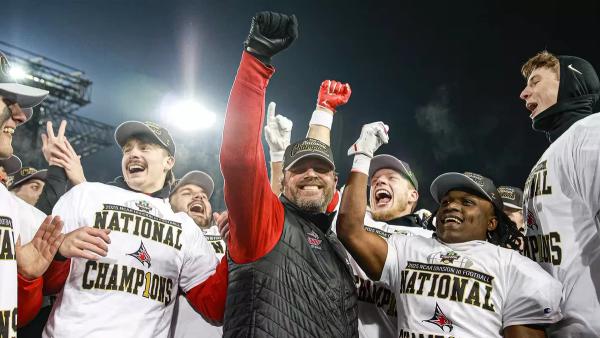 Matt Walker celebrates winning the Division III National Championship
