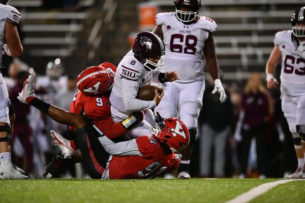 Youngstown State's Dawan Martin and Chris Fitzgerald combine to tackle Southern Illinois QB Nic Baker