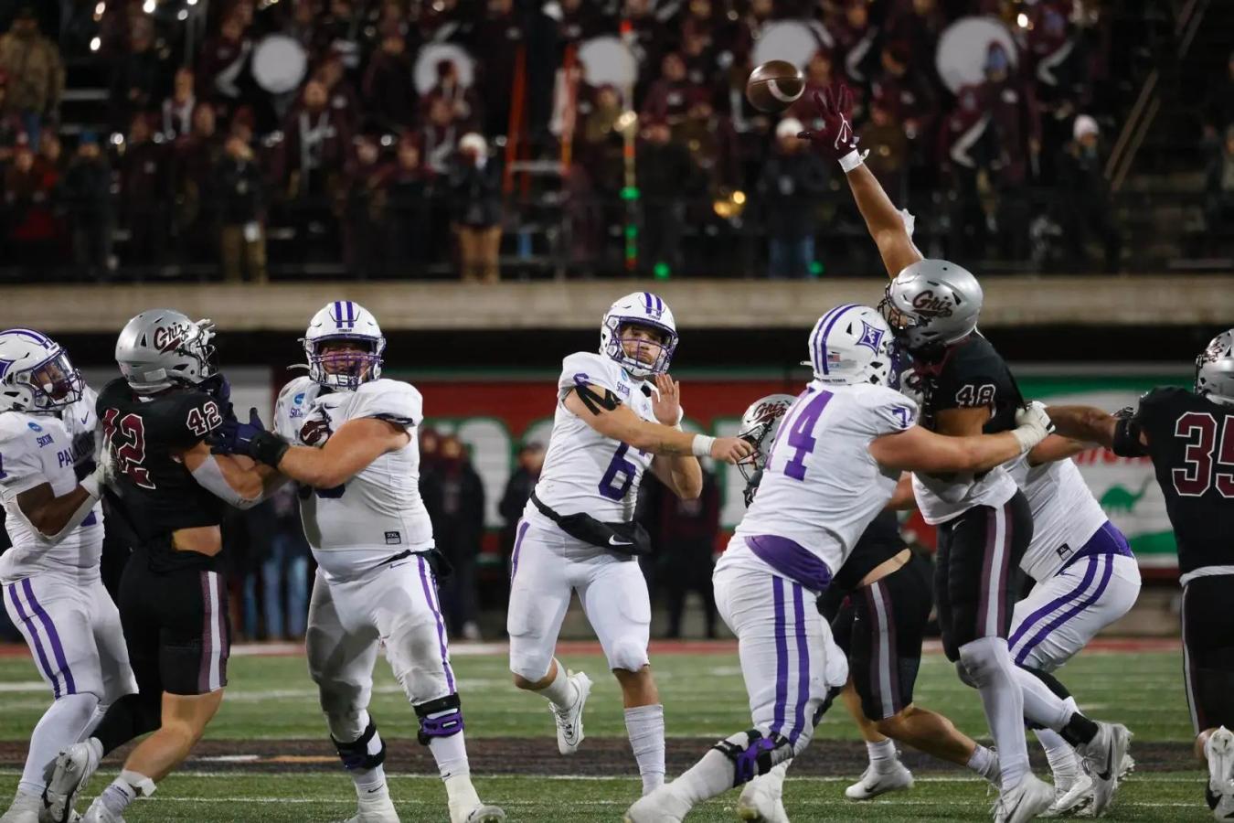 Furman's QB Tyler Huff throws a pass against Montana in the quarterfinals of the 2023 FCS Playoffs.