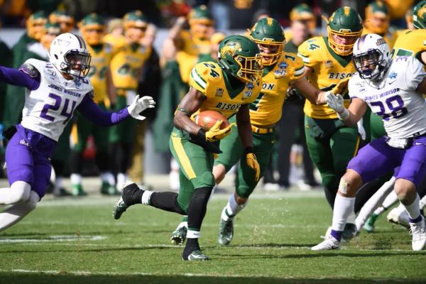 NDSU's Kobe Johnson rushes against JMU