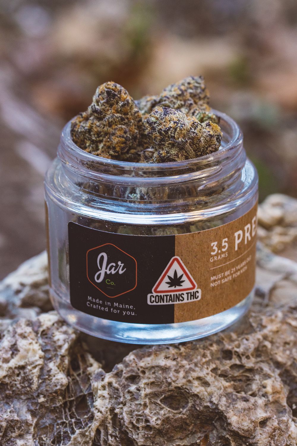 Cadillac Rainbows hybrid strain from JAR Cannabis displayed in glass jar