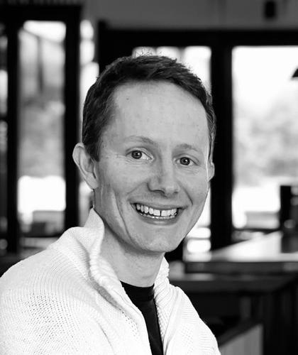 An image of Alexander that smiles in the camera