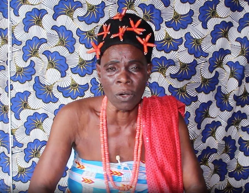 A woman singing Songs as Documentation of Pre-Colonial Benin History