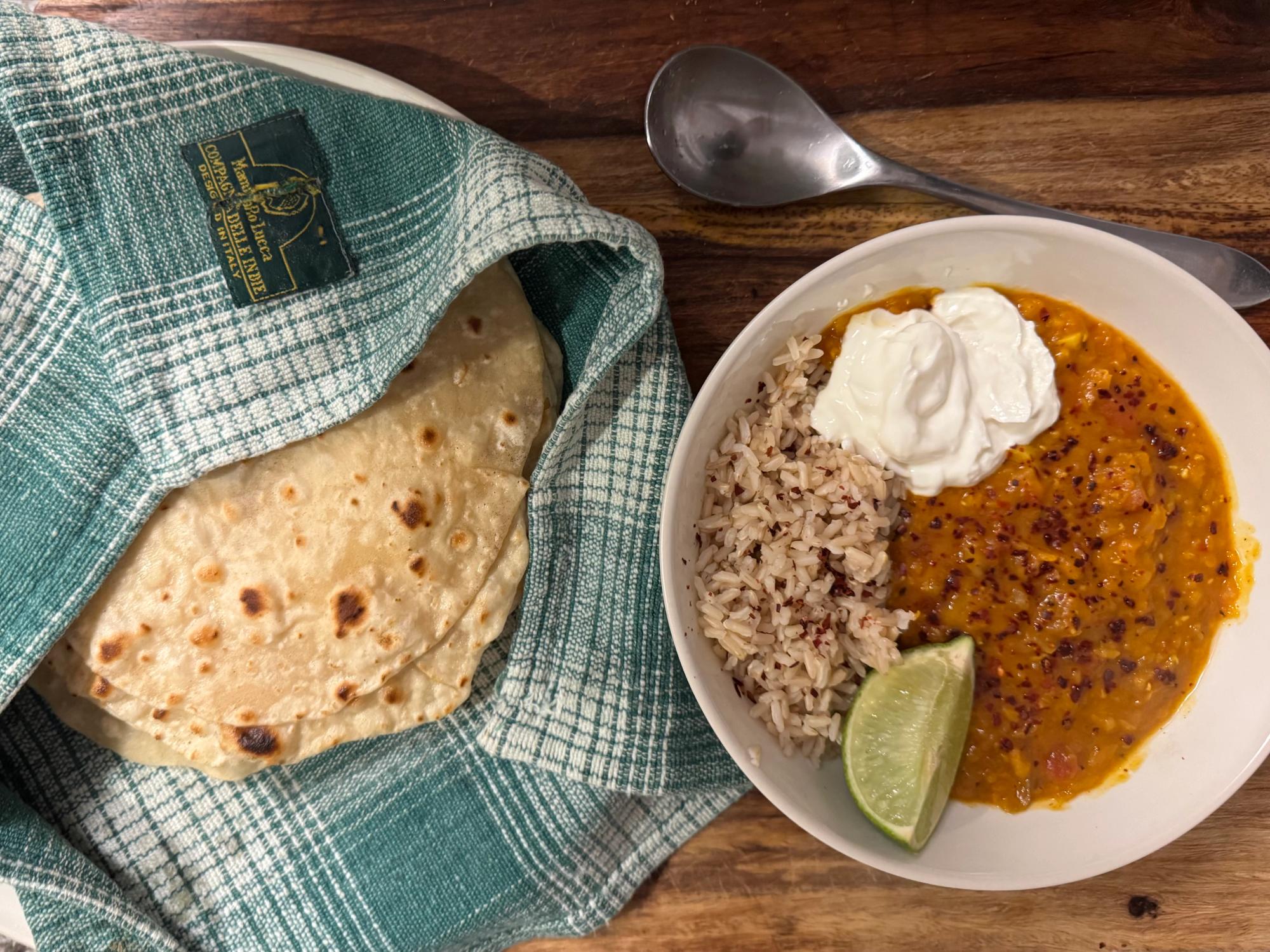 Red lentil dahl with wild rice and homemade roti