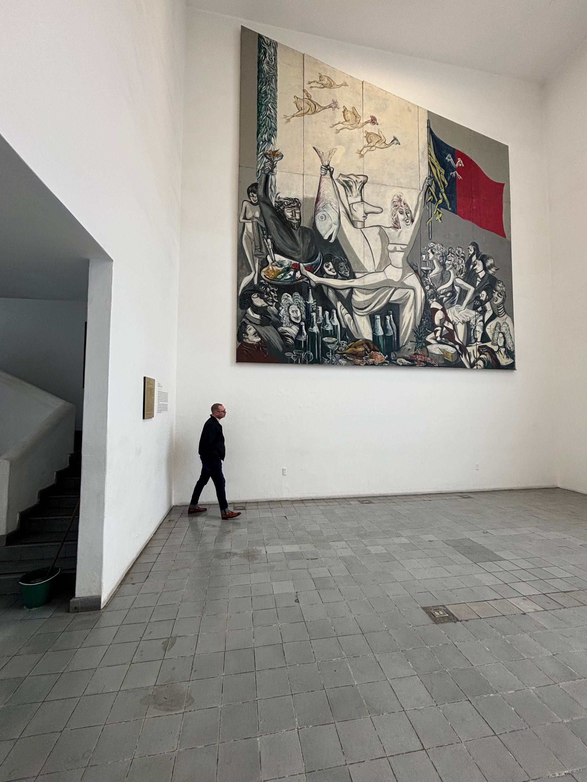 A restored and relocated Orozco mural. Author for scale